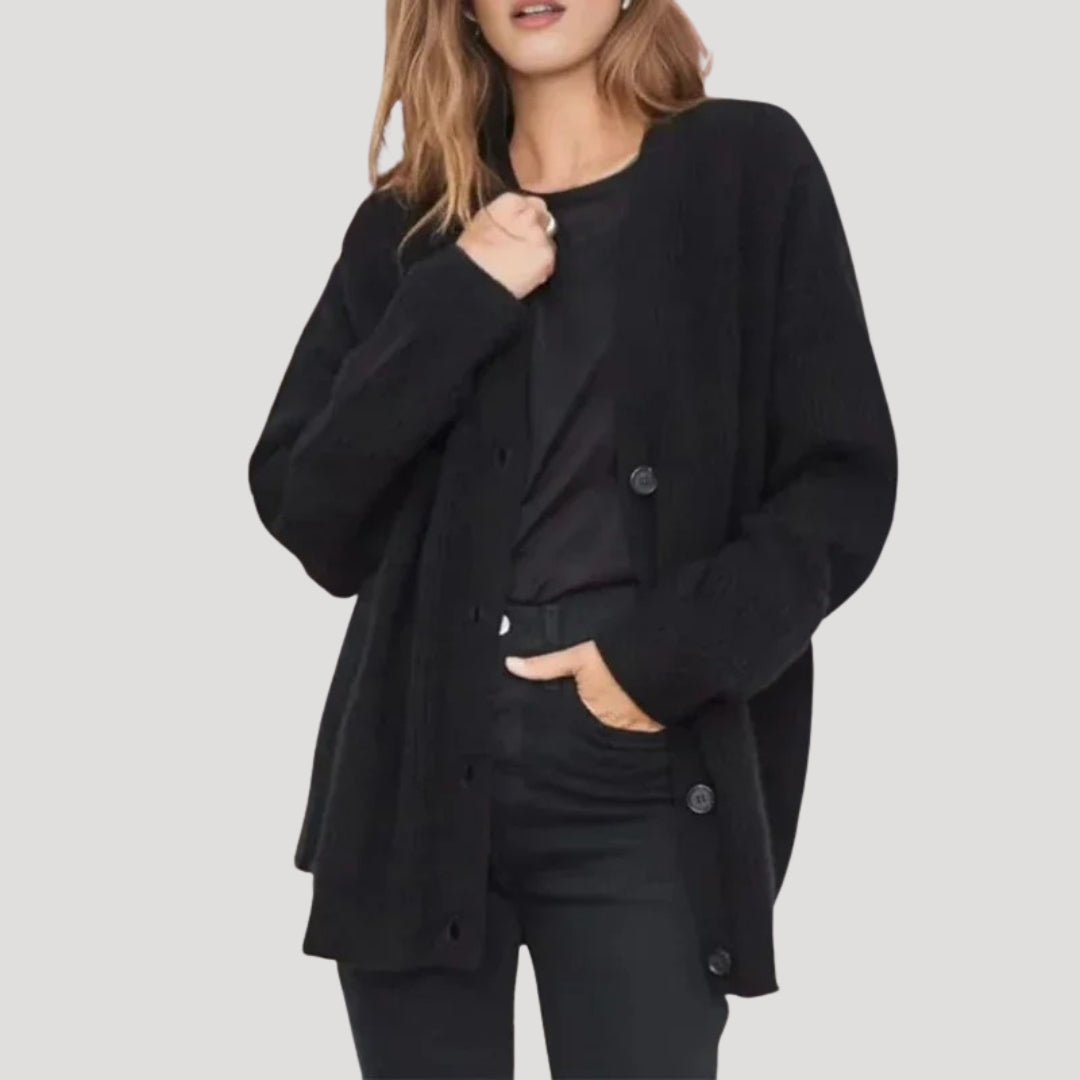 Women’s oversized knit cardigan with button front in chunky ribbed design for layering