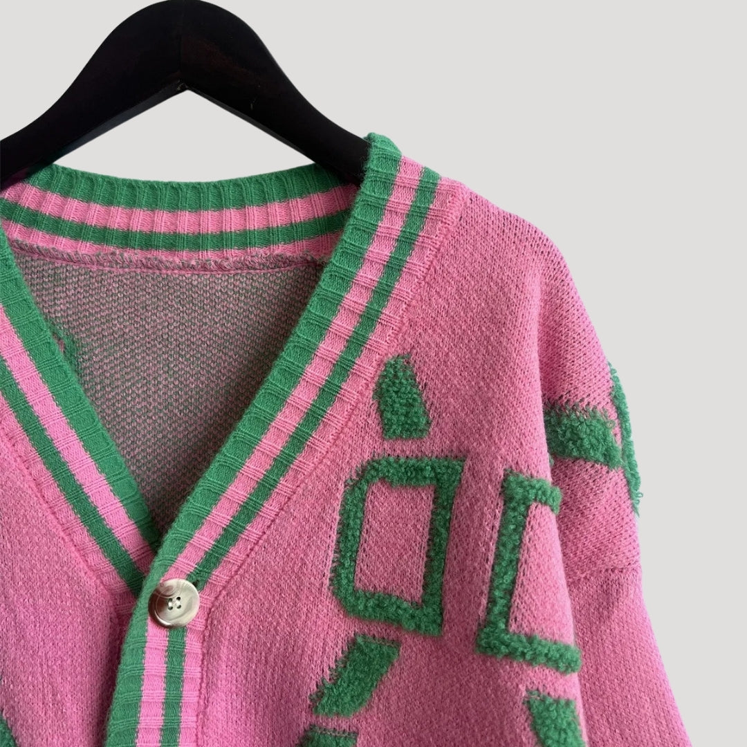 Women’s oversized graphic knit cardigan with v neck button up front