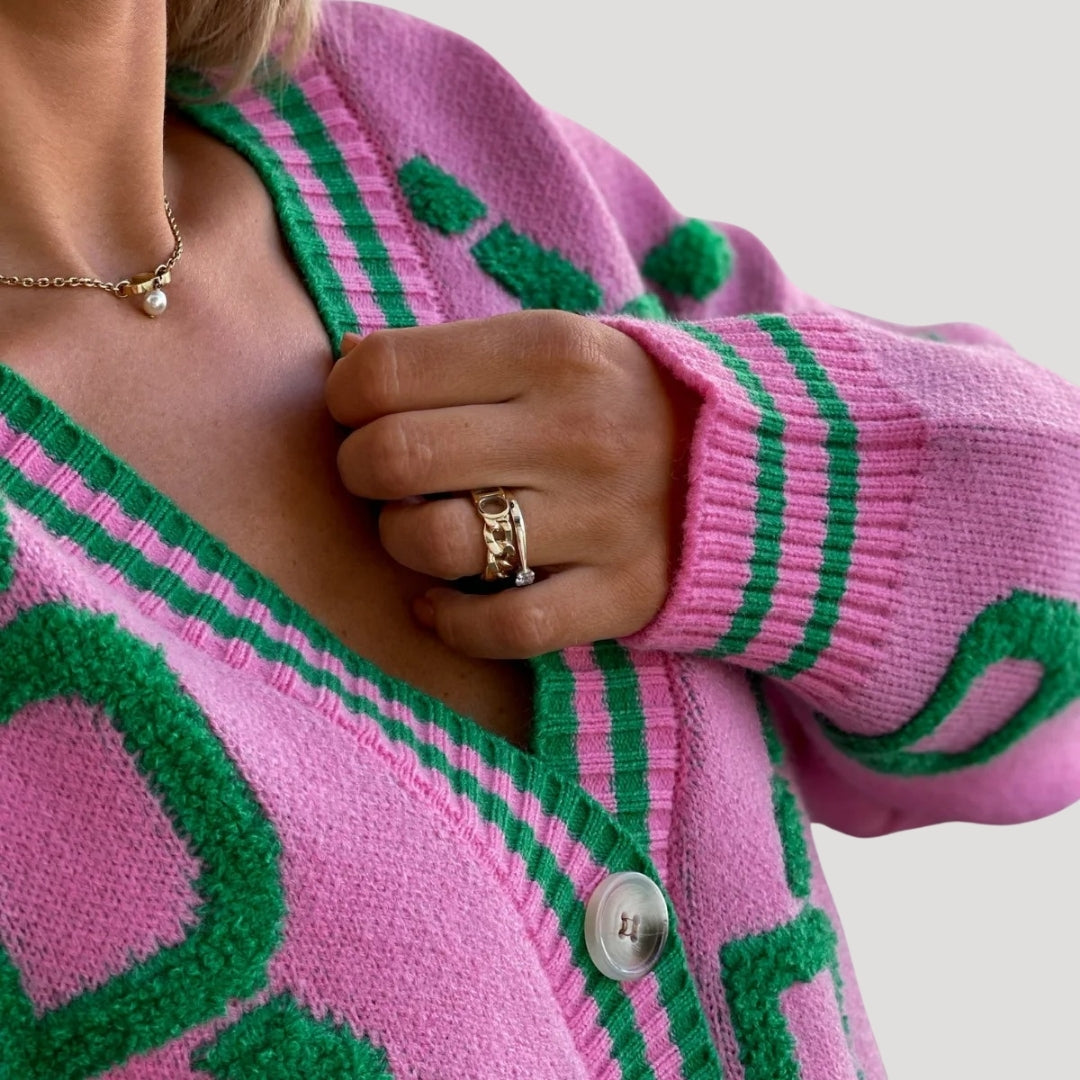 Women’s oversized graphic knit cardigan with v neck button up front