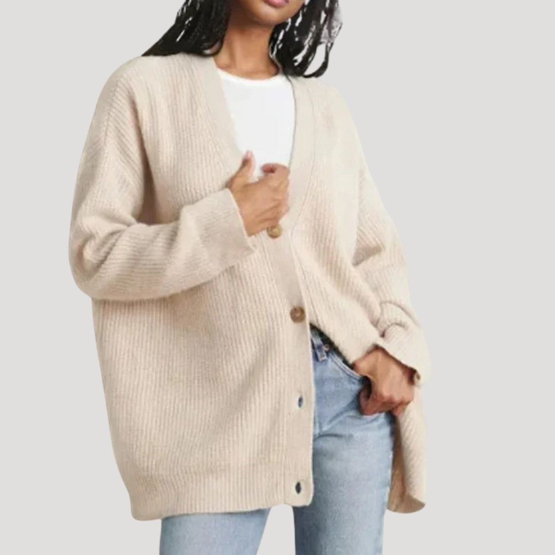 Women’s oversized knit cardigan with button front in chunky ribbed design for layering
