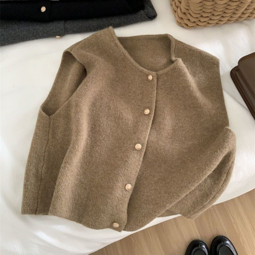 Women’s knitted sleeveless vest cardigan jumper with button front for layering