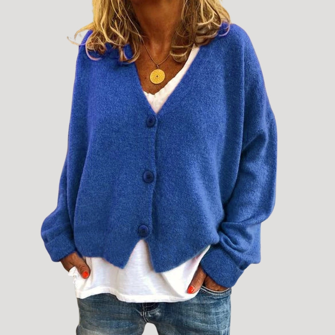 Women’s chunky cable knit cardigan with button up front for layering