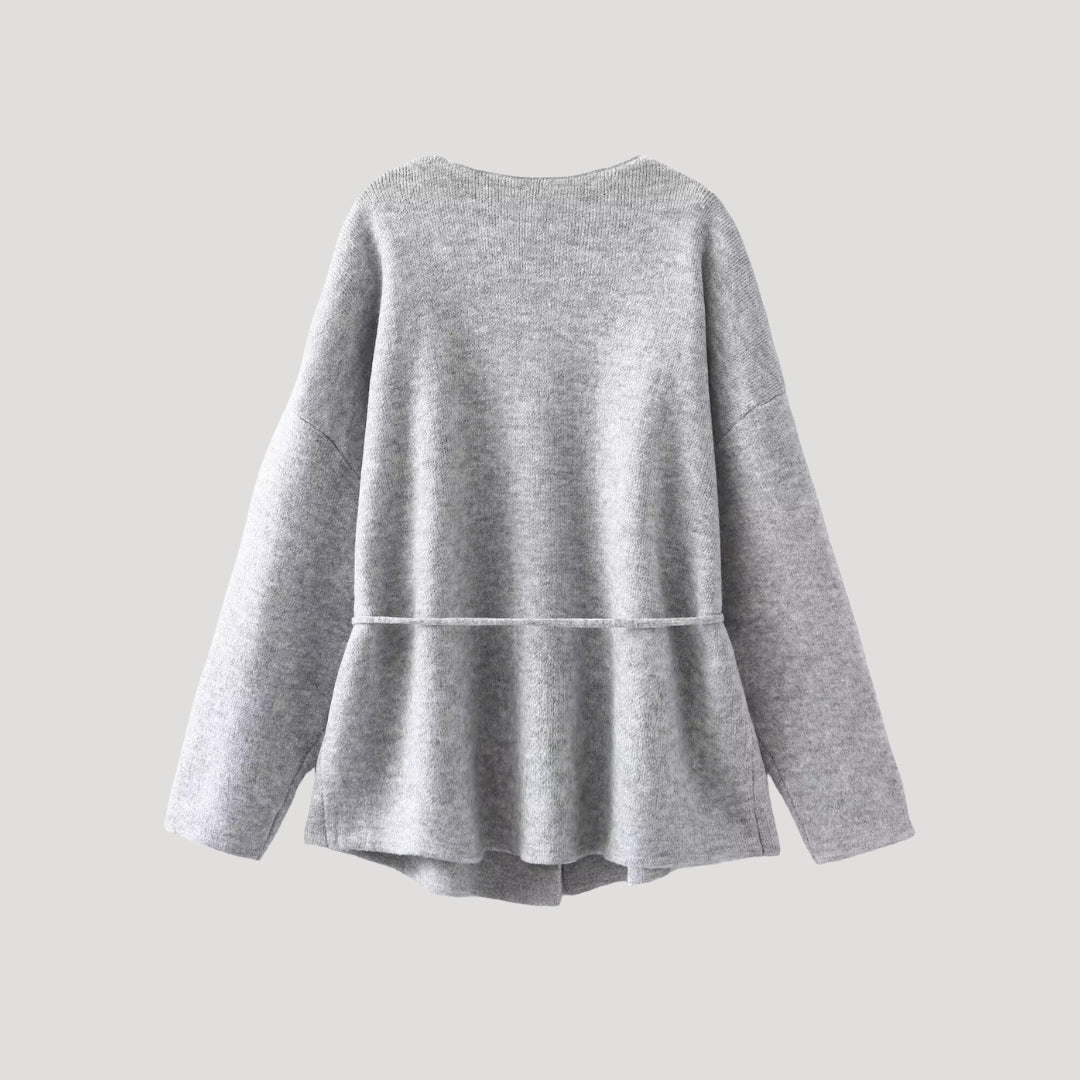 Women’s knit belted cardigan with peplum hem and V neck wrap style