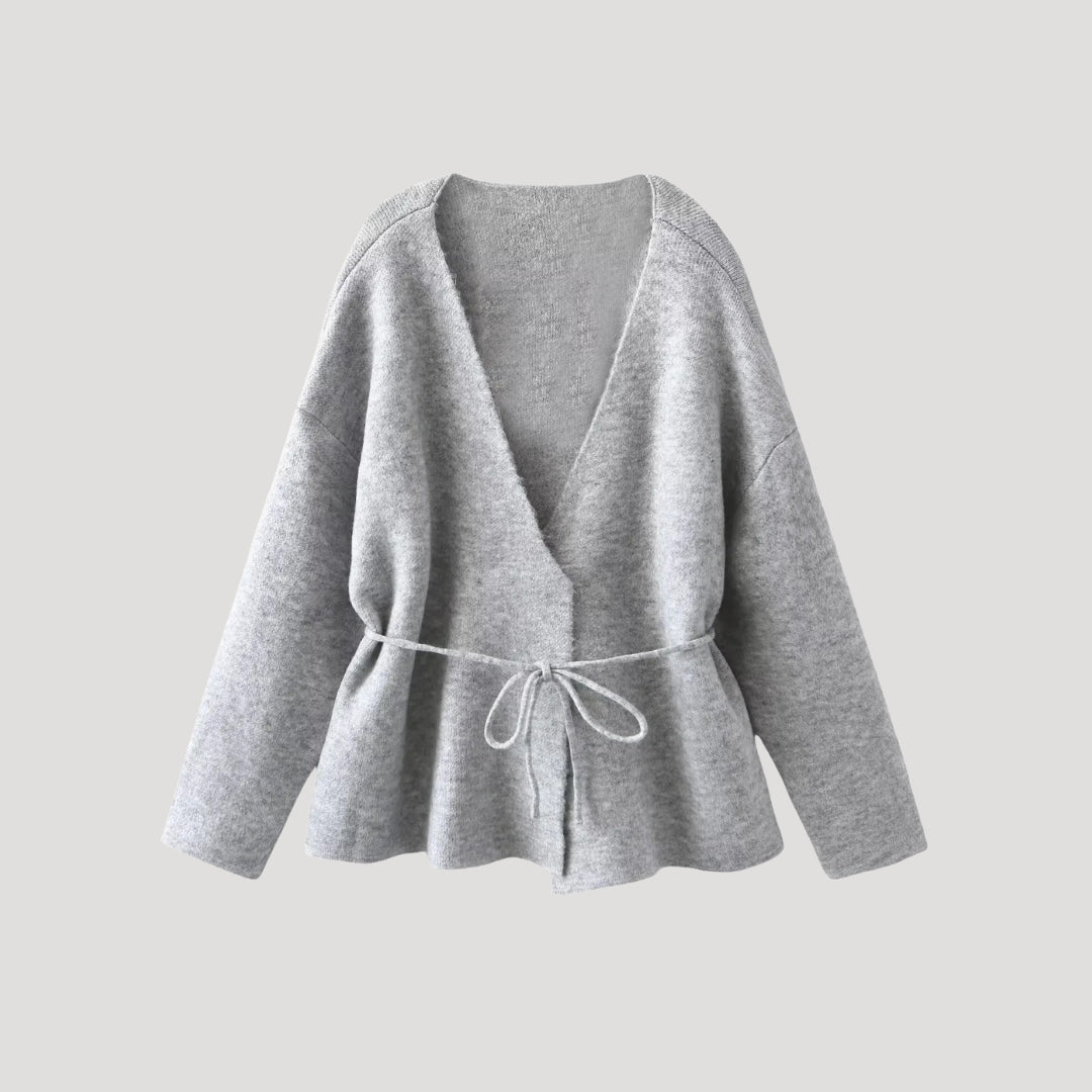 Women’s knit belted cardigan with peplum hem and V neck wrap style